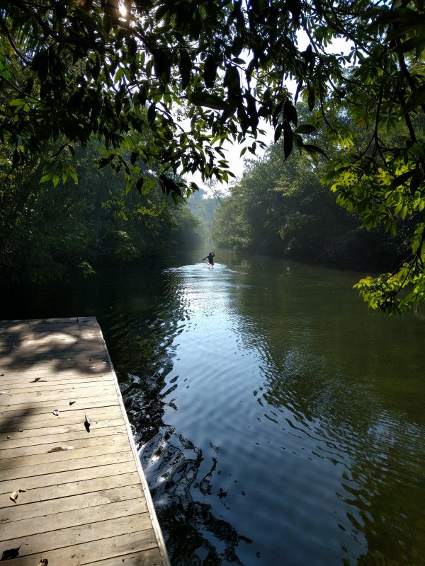 Ak' Tenamit - Canoeing on the side stream.