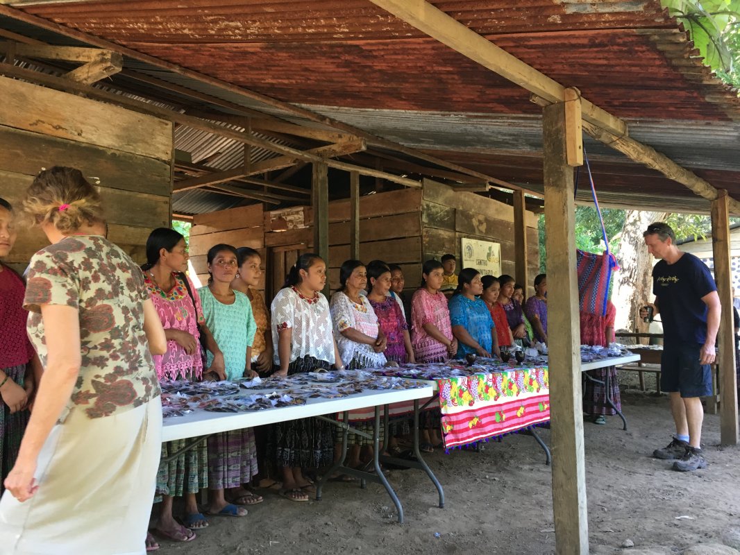 Seacacar - The Village women displaying their hand made earrings and necklaces